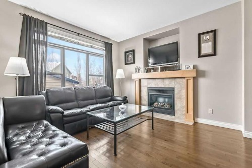 280 Copperstone Gardens Se, Calgary, AB - Indoor Photo Showing Living Room With Fireplace