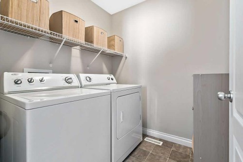 280 Copperstone Gardens Se, Calgary, AB - Indoor Photo Showing Laundry Room