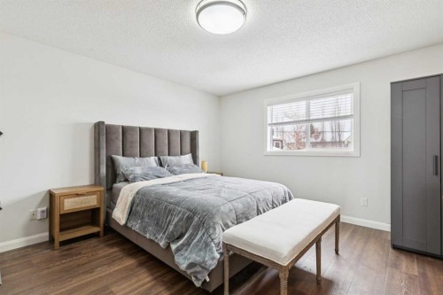 60 Erin Meadow Way Se, Calgary, AB - Indoor Photo Showing Bedroom