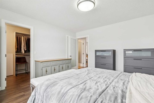 60 Erin Meadow Way Se, Calgary, AB - Indoor Photo Showing Bedroom