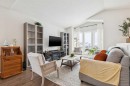 60 Erin Meadow Way Se, Calgary, AB  - Indoor Photo Showing Living Room 