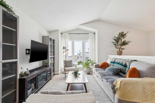 60 Erin Meadow Way Se, Calgary, AB - Indoor Photo Showing Living Room