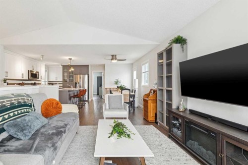 60 Erin Meadow Way Se, Calgary, AB - Indoor Photo Showing Living Room With Fireplace
