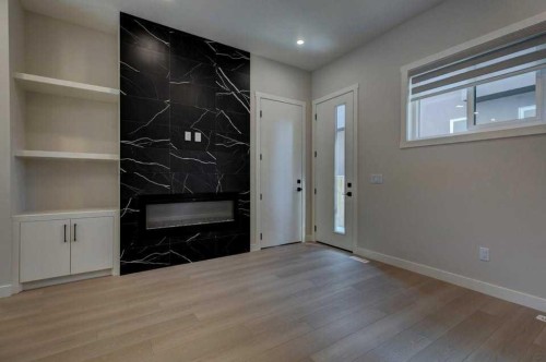 602 11 Avenue Ne, Calgary, AB - Indoor With Fireplace