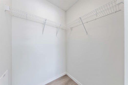 419-245 Edith Place Nw, Calgary, AB - Indoor With Storage