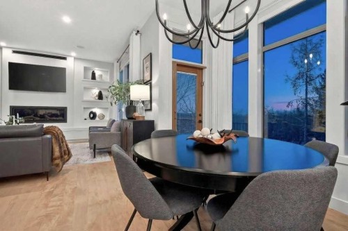 55 Cougar Plateau Circle Sw, Calgary, AB - Indoor Photo Showing Other Room With Fireplace