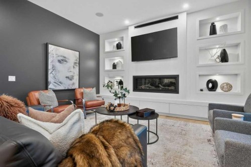 55 Cougar Plateau Circle Sw, Calgary, AB - Indoor Photo Showing Living Room With Fireplace