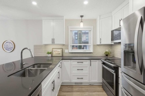 3426 5 Avenue Nw, Calgary, AB - Indoor Photo Showing Kitchen With Stainless Steel Kitchen With Double Sink With Upgraded Kitchen