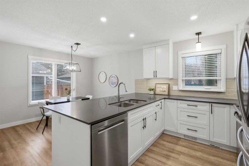 3426 5 Avenue Nw, Calgary, AB - Indoor Photo Showing Kitchen With Double Sink