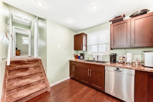 36 Castleglen Way Ne, Calgary, AB - Indoor Photo Showing Kitchen With Double Sink