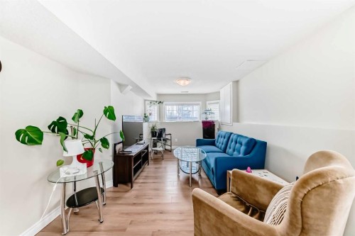 172 Sunset Heights, Crossfield, AB - Indoor Photo Showing Living Room