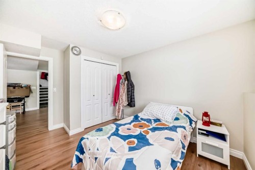 172 Sunset Heights, Crossfield, AB - Indoor Photo Showing Bedroom