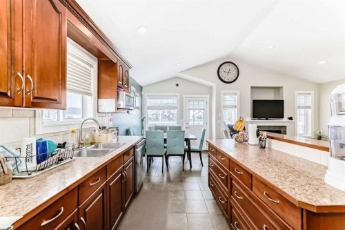 172 Sunset Heights, Crossfield, AB - Indoor Photo Showing Kitchen With Double Sink