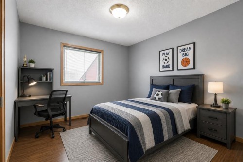 10 Madison Court, Strathmore, AB - Indoor Photo Showing Bedroom