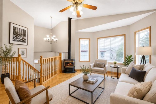 10 Madison Court, Strathmore, AB - Indoor Photo Showing Living Room With Fireplace