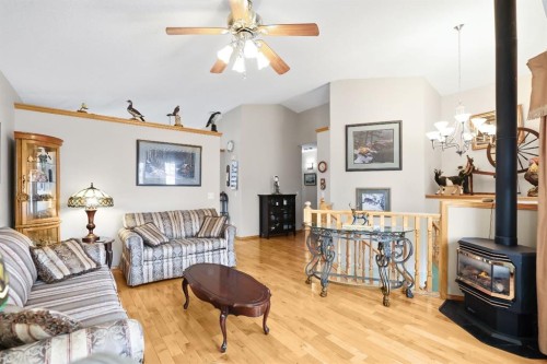 10 Madison Court, Strathmore, AB - Indoor Photo Showing Living Room With Fireplace