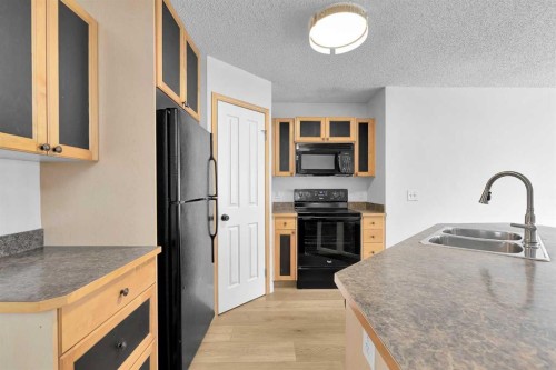 89 Covebrook Place Ne, Calgary, AB - Indoor Photo Showing Kitchen With Double Sink