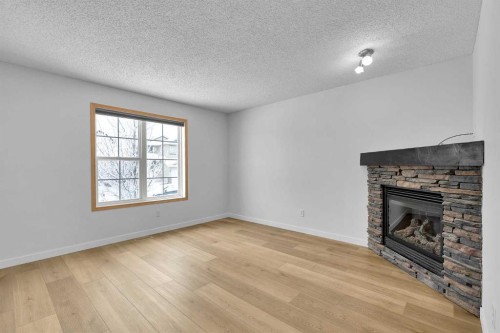 89 Covebrook Place Ne, Calgary, AB - Indoor With Fireplace