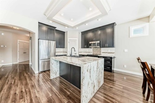 153 Van Slyke Way, Red Deer, AB - Indoor Photo Showing Kitchen With Stainless Steel Kitchen With Double Sink With Upgraded Kitchen