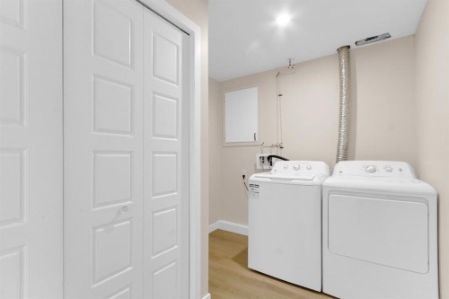 956 Bracewood Rise Sw, Calgary, AB - Indoor Photo Showing Laundry Room