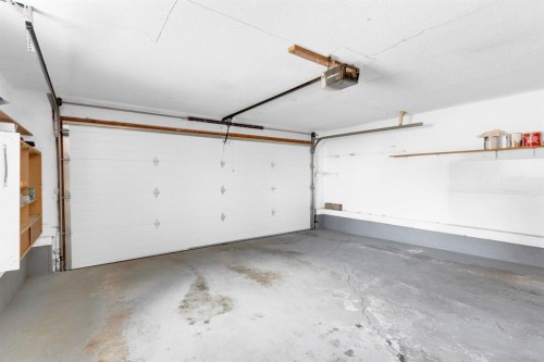 956 Bracewood Rise Sw, Calgary, AB - Indoor Photo Showing Garage