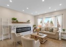 956 Bracewood Rise Sw, Calgary, AB  - Indoor Photo Showing Living Room With Fireplace 