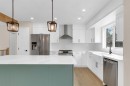 956 Bracewood Rise Sw, Calgary, AB  - Indoor Photo Showing Kitchen With Stainless Steel Kitchen With Upgraded Kitchen 