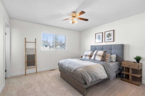 78 Hidden Spring Green Nw, Calgary, AB - Indoor Photo Showing Bedroom