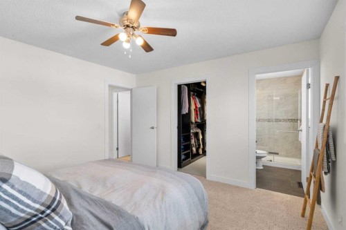 78 Hidden Spring Green Nw, Calgary, AB - Indoor Photo Showing Bedroom