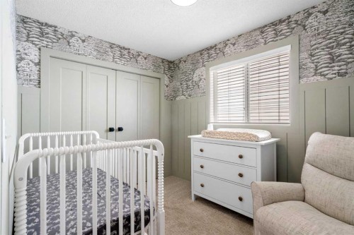 78 Hidden Spring Green Nw, Calgary, AB - Indoor Photo Showing Bedroom