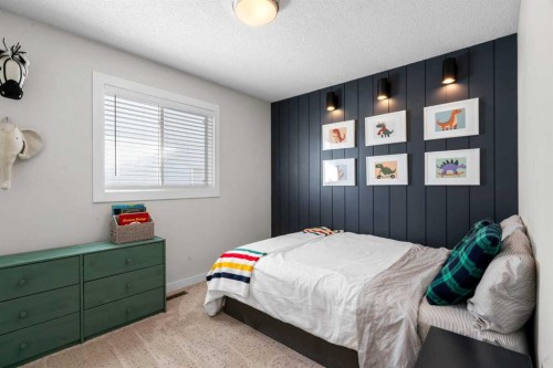 78 Hidden Spring Green Nw, Calgary, AB - Indoor Photo Showing Bedroom