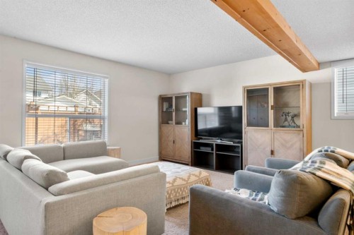 78 Hidden Spring Green Nw, Calgary, AB - Indoor Photo Showing Living Room