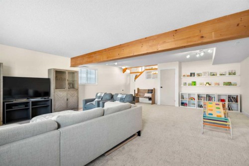 78 Hidden Spring Green Nw, Calgary, AB - Indoor Photo Showing Basement
