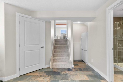 78 Hidden Spring Green Nw, Calgary, AB - Indoor Photo Showing Other Room