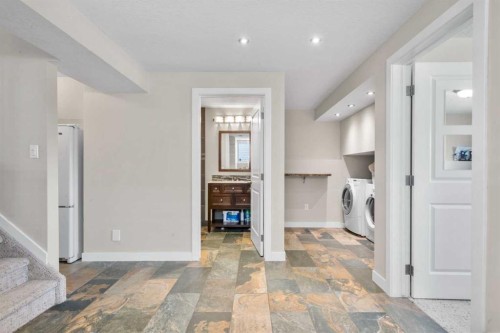 78 Hidden Spring Green Nw, Calgary, AB - Indoor Photo Showing Other Room