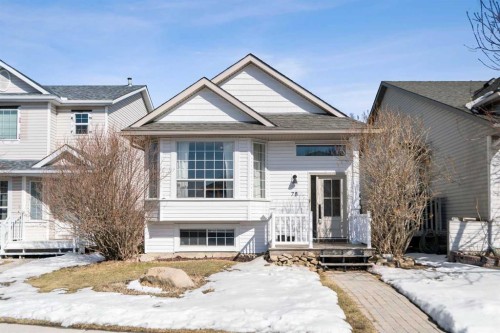 78 Hidden Spring Green Nw, Calgary, AB - Outdoor With Facade