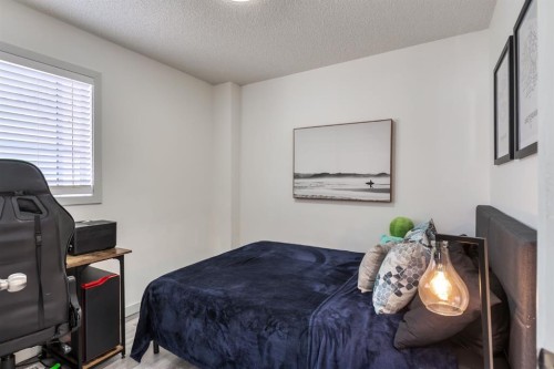303 Coventry Close Ne, Calgary, AB - Indoor Photo Showing Bedroom