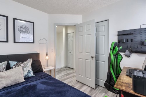 303 Coventry Close Ne, Calgary, AB - Indoor Photo Showing Bedroom