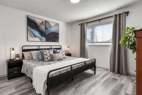 303 Coventry Close Ne, Calgary, AB - Indoor Photo Showing Bedroom