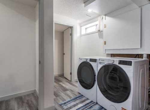 303 Coventry Close Ne, Calgary, AB - Indoor Photo Showing Laundry Room