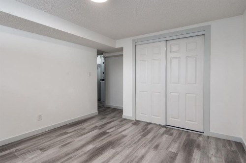 303 Coventry Close Ne, Calgary, AB - Indoor Photo Showing Other Room