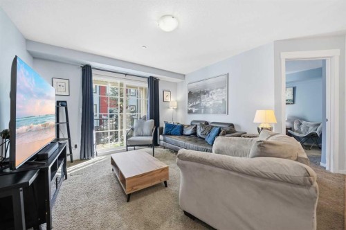 2208-99 Copperstone Park Se, Calgary, AB - Indoor Photo Showing Living Room