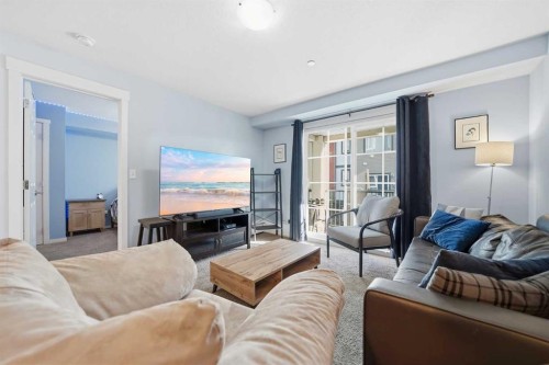 2208-99 Copperstone Park Se, Calgary, AB - Indoor Photo Showing Living Room