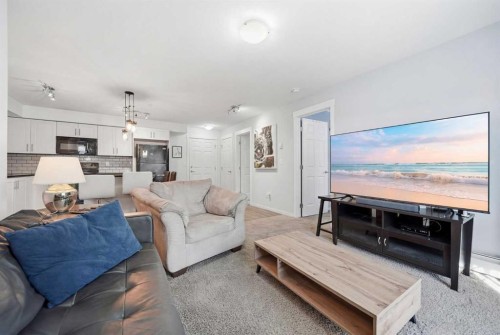 2208-99 Copperstone Park Se, Calgary, AB - Indoor Photo Showing Living Room