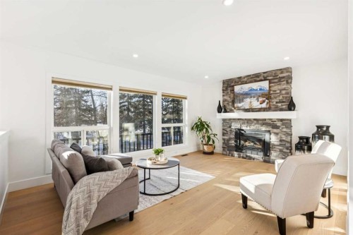 5 Mckenzie Lake Point Se, Calgary, AB - Indoor Photo Showing Living Room With Fireplace