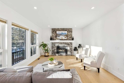 5 Mckenzie Lake Point Se, Calgary, AB - Indoor Photo Showing Living Room With Fireplace
