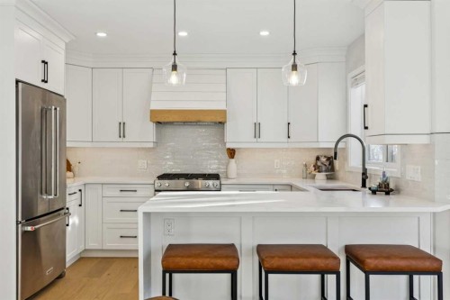 5 Mckenzie Lake Point Se, Calgary, AB - Indoor Photo Showing Kitchen With Upgraded Kitchen