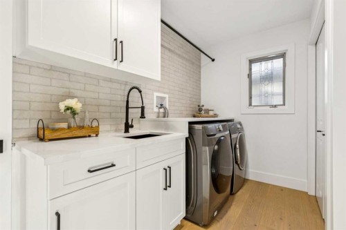 5 Mckenzie Lake Point Se, Calgary, AB - Indoor Photo Showing Laundry Room