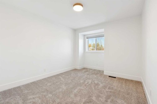 5 Mckenzie Lake Point Se, Calgary, AB - Indoor Photo Showing Other Room
