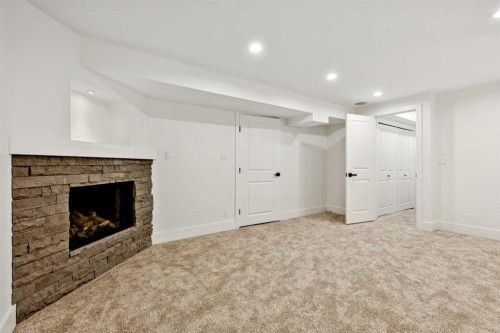 5 Mckenzie Lake Point Se, Calgary, AB - Indoor With Fireplace